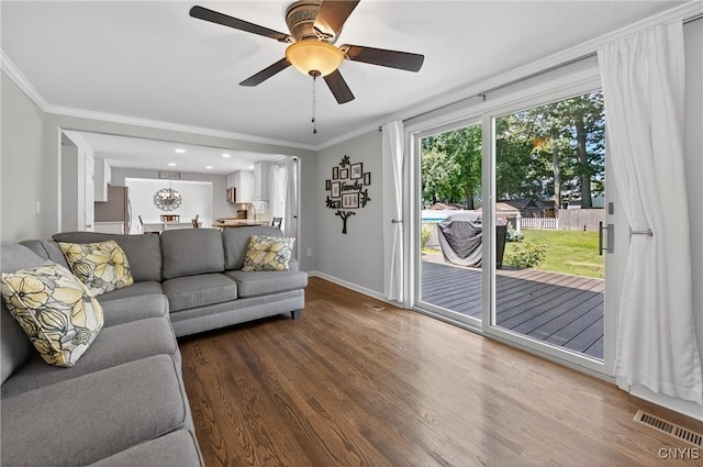 208 Single Dr, Clay, NY 13212 - living area featuring ornamental molding, wood finished floors, and ceiling fan