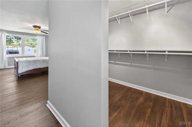 208 Single Dr, Clay, NY 13212 - spacious closet with wood finished floors and a ceiling fan