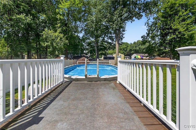 208 Single Dr, Clay, NY 13212 - view of swimming pool featuring a storage shed and a fenced backyard