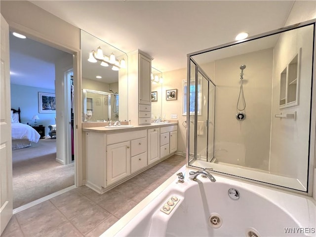 39 Wickendon Ct, Amherst, NY 14221 - ensuite bathroom with a shower stall, double vanity, a whirlpool tub, and tile patterned flooring