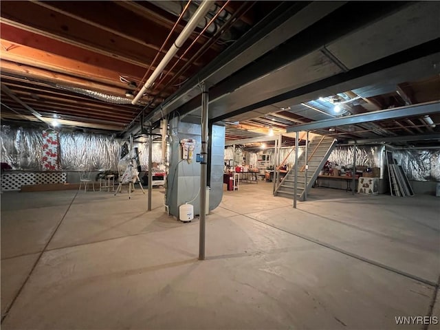 39 Wickendon Ct, Amherst, NY 14221 - unfinished below grade area featuring heating unit and stairway