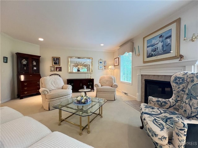39 Wickendon Ct, Amherst, NY 14221 - living room with light colored carpet, a tile fireplace, recessed lighting, and crown molding