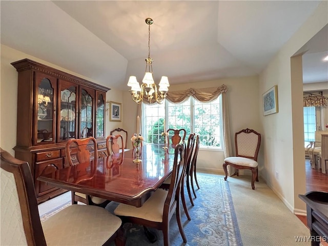 39 Wickendon Ct, Amherst, NY 14221 - dining space with a chandelier and carpet flooring