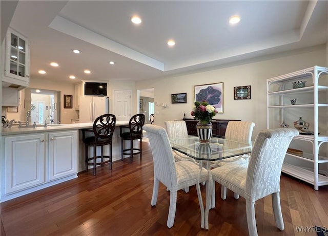 39 Wickendon Ct, Amherst, NY 14221 - dining room with a tray ceiling, dark wood finished floors, and recessed lighting