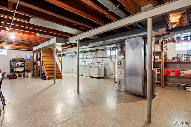 301 Pleasant View Dr, Lancaster, NY 14086 - below grade area featuring gas water heater, tile patterned floors, washer and dryer, stairway, and heating unit