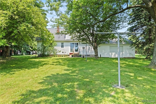 301 Pleasant View Dr, Lancaster, NY 14086 - view of green lawn featuring entry steps and a garage