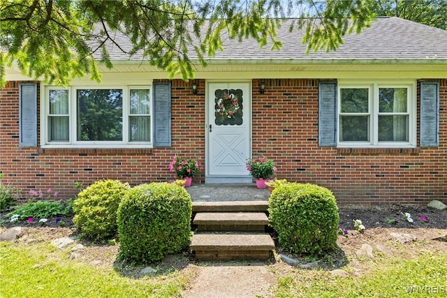 301 Pleasant View Dr, Lancaster, NY 14086 - entrance to property featuring brick siding and roof with shingles