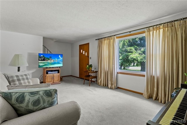 301 Pleasant View Dr, Lancaster, NY 14086 - living room featuring light colored carpet and a textured ceiling