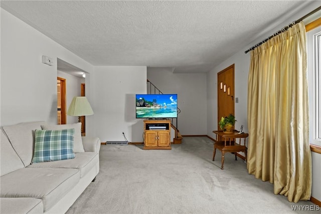 301 Pleasant View Dr, Lancaster, NY 14086 - living area with light carpet and a textured ceiling