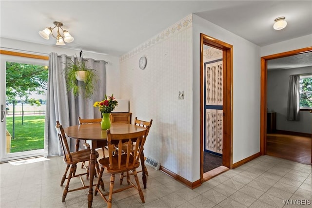 301 Pleasant View Dr, Lancaster, NY 14086 - dining area with baseboards and light floors