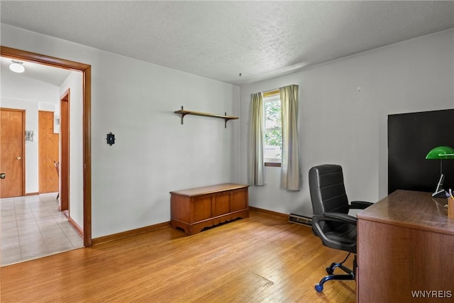301 Pleasant View Dr, Lancaster, NY 14086 - home office featuring light wood finished floors and a textured ceiling