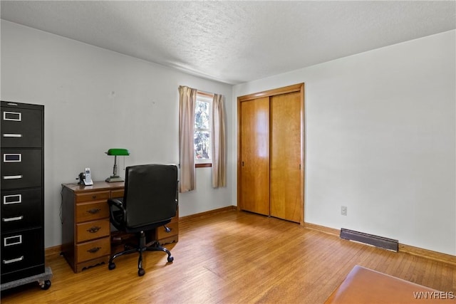 301 Pleasant View Dr, Lancaster, NY 14086 - office space with light wood-type flooring and a textured ceiling