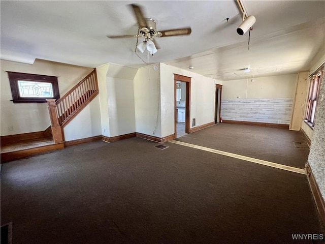 83 Andover Ave, Buffalo, NY 14215 - unfurnished room featuring a ceiling fan, healthy amount of natural light, and carpet