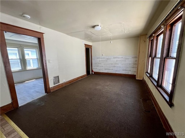 83 Andover Ave, Buffalo, NY 14215 - empty room featuring a smoke detector and dark colored carpet