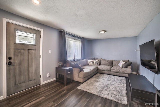 112 Nokomis Pkwy, Cheektowaga, NY 14225 - living room with a textured ceiling and dark wood-type flooring