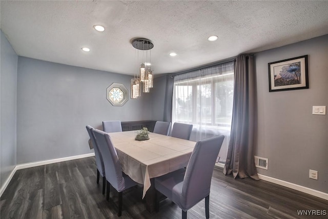 112 Nokomis Pkwy, Cheektowaga, NY 14225 - dining space with a textured ceiling, dark wood-style flooring, recessed lighting, and a chandelier
