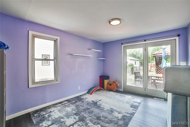 112 Nokomis Pkwy, Cheektowaga, NY 14225 - unfurnished bedroom featuring access to outside and wood finished floors