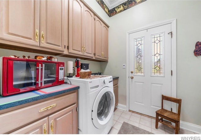 7 The Hamlet, Amherst, NY 14051 - laundry area featuring washer / clothes dryer, cabinet space, and light tile patterned floors