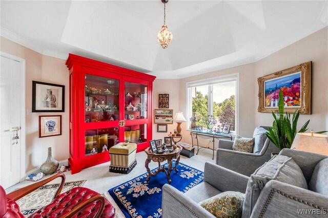 7 The Hamlet, Amherst, NY 14051 - living room with carpet flooring, a raised ceiling, and ornamental molding