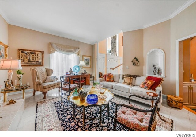 7 The Hamlet, Amherst, NY 14051 - living area with tile patterned flooring and crown molding