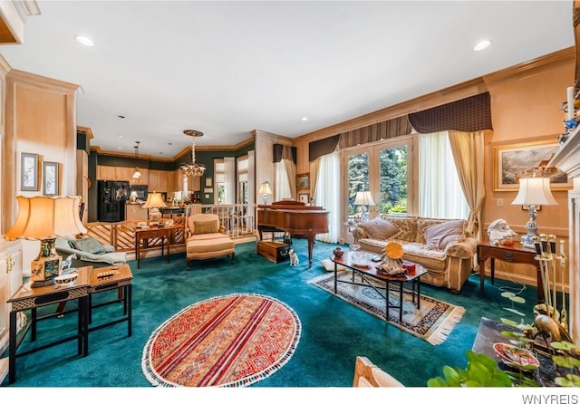 7 The Hamlet, Amherst, NY 14051 - carpeted living area with ornamental molding, a chandelier, and recessed lighting