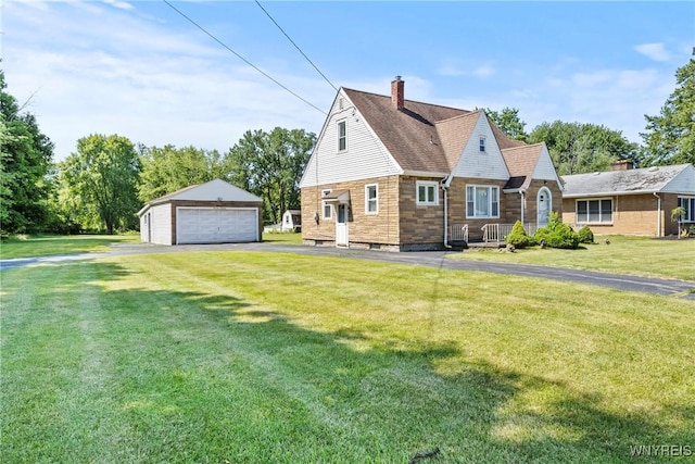 1419 Maple Rd, Amherst, NY 14221 - view of property exterior with an outdoor structure, a detached garage, a chimney, a yard, and stone siding