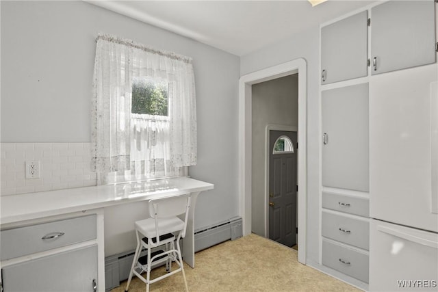 1419 Maple Rd, Amherst, NY 14221 - home office with a baseboard radiator and carpet