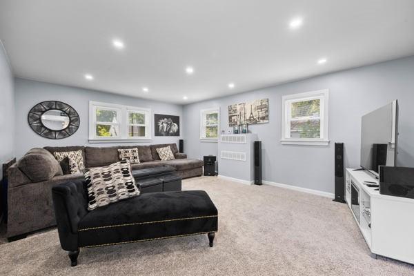 95 Ridgemar Rd, Greece, NY 14615 - carpeted living room with recessed lighting and healthy amount of natural light