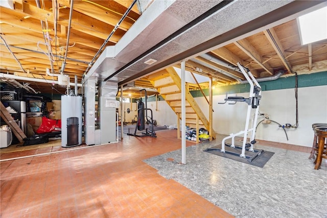 193 Orchard Creek Ln, Greece, NY 14612 - exercise area with water heater and heating unit