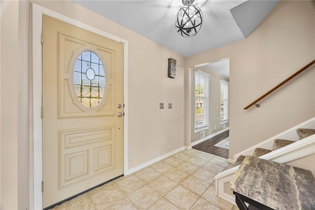 193 Orchard Creek Ln, Greece, NY 14612 - tiled foyer with plenty of natural light and stairs