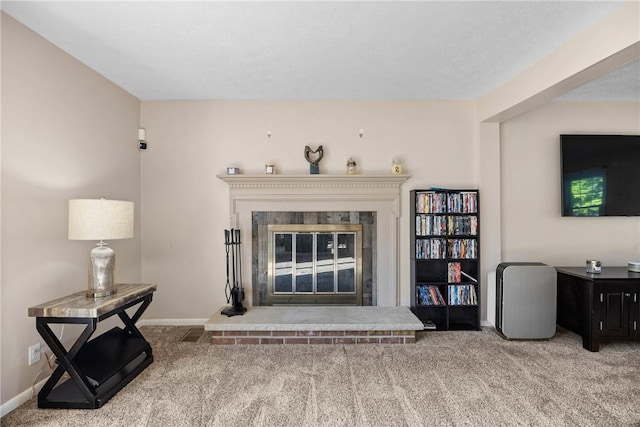 193 Orchard Creek Ln, Greece, NY 14612 - living area featuring a glass covered fireplace and carpet flooring