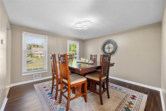 193 Orchard Creek Ln, Greece, NY 14612 - dining room with baseboards and wood finished floors