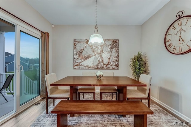 3398 Cedar Valley Way, Hamburg, NY 14075 - dining space featuring light wood finished floors and baseboards