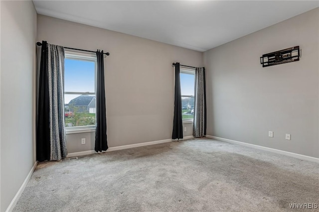 3398 Cedar Valley Way, Hamburg, NY 14075 - empty room featuring carpet floors and baseboards