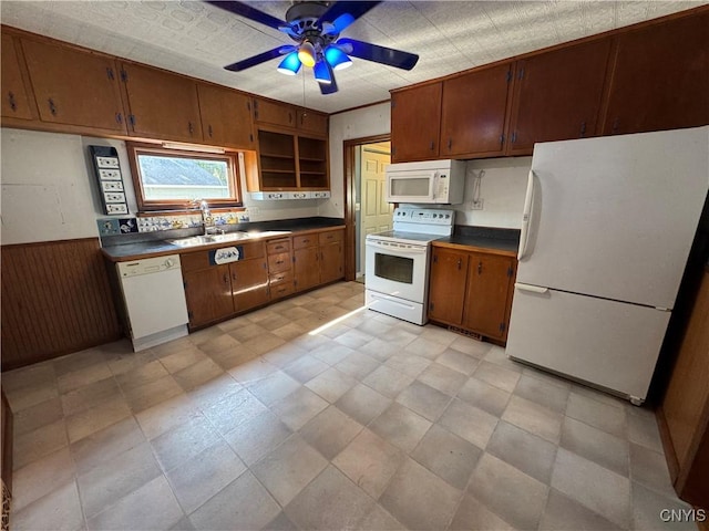 410 W Elm St, Oneida, NY 13421 - kitchen featuring white appliances, a ceiling fan, dark countertops, brown cabinets, and open shelves
