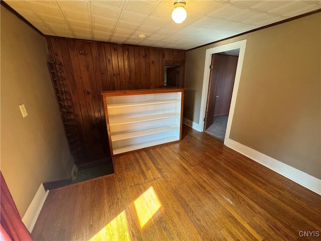 410 W Elm St, Oneida, NY 13421 - bar area featuring wood finished floors and wooden walls
