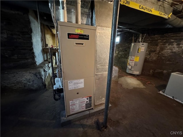 410 W Elm St, Oneida, NY 13421 - utility room with gas water heater and heating unit