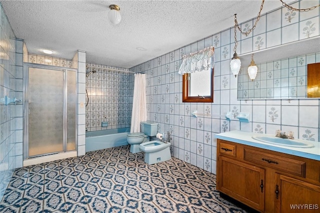270 N French Rd, Amherst, NY 14228 - bathroom featuring a textured ceiling, vanity, a bidet, shower / tub combo, and tile walls