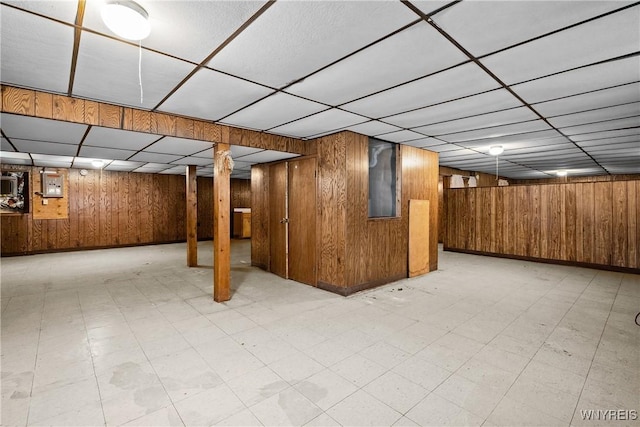270 N French Rd, Amherst, NY 14228 - finished basement featuring light floors, wood walls, a drop ceiling, and electric panel