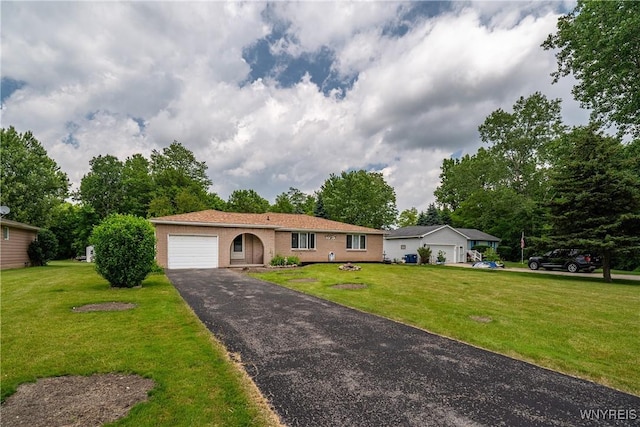 270 N French Rd, Amherst, NY 14228 - single story home featuring driveway, a garage, a front lawn, and brick siding