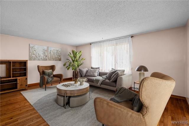 270 N French Rd, Amherst, NY 14228 - living area with wood finished floors and a textured ceiling