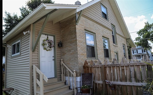 561 W Washington Ave, Elmira City, NY 14901 - view of front of house with entry steps and brick siding