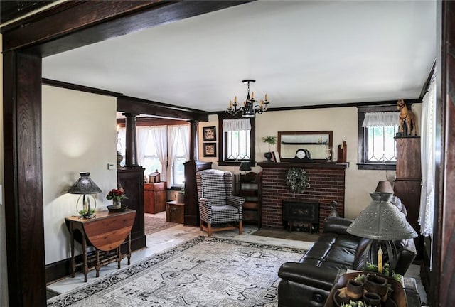 561 W Washington Ave, Elmira City, NY 14901 - living area featuring ornamental molding and a chandelier