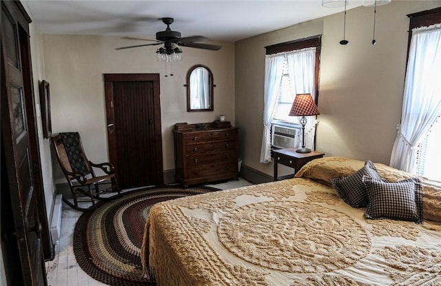 561 W Washington Ave, Elmira City, NY 14901 - bedroom with cooling unit and ceiling fan