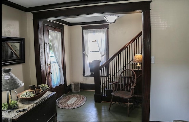 561 W Washington Ave, Elmira City, NY 14901 - entryway with stairs, wood finished floors, and ornamental molding