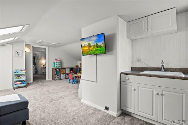 49 Mang Ave, Tonawanda, NY 14217 - playroom with vaulted ceiling and light colored carpet