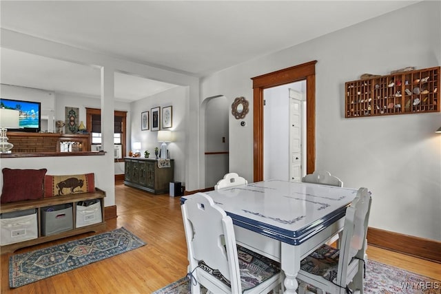 49 Mang Ave, Tonawanda, NY 14217 - dining area featuring wood finished floors and arched walkways