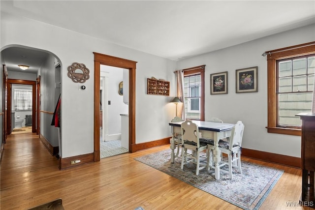 49 Mang Ave, Tonawanda, NY 14217 - dining area with arched walkways and wood finished floors