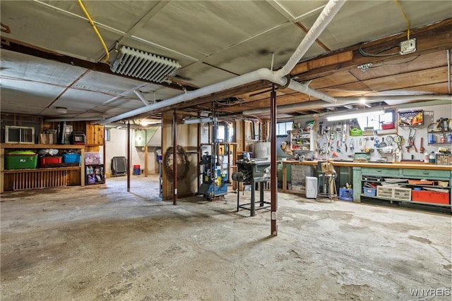 49 Mang Ave, Tonawanda, NY 14217 - unfinished below grade area with a workshop area
