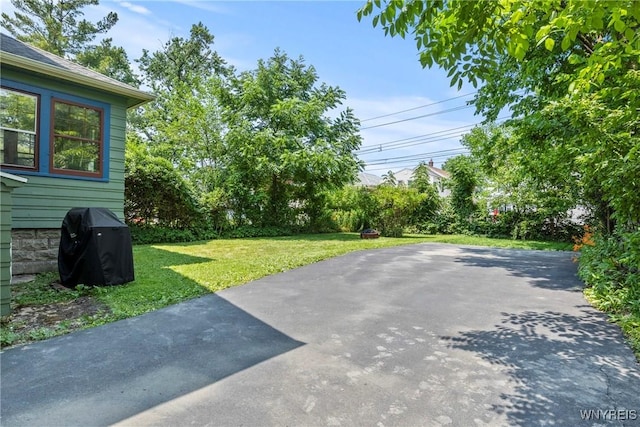 49 Mang Ave, Tonawanda, NY 14217 - view of grassy yard with a patio area